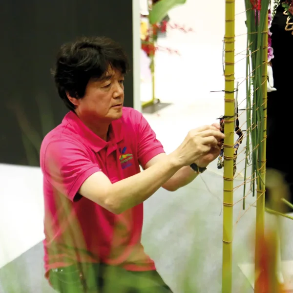 Hiroto Inoue, Japan, working on his design during the Floral Windows to the World Championship 1 CMYK300DPI